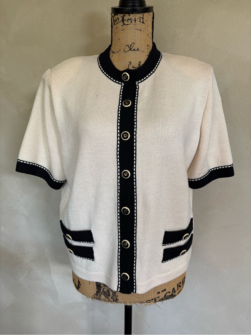 St. John short sleeve cardigan sweater.